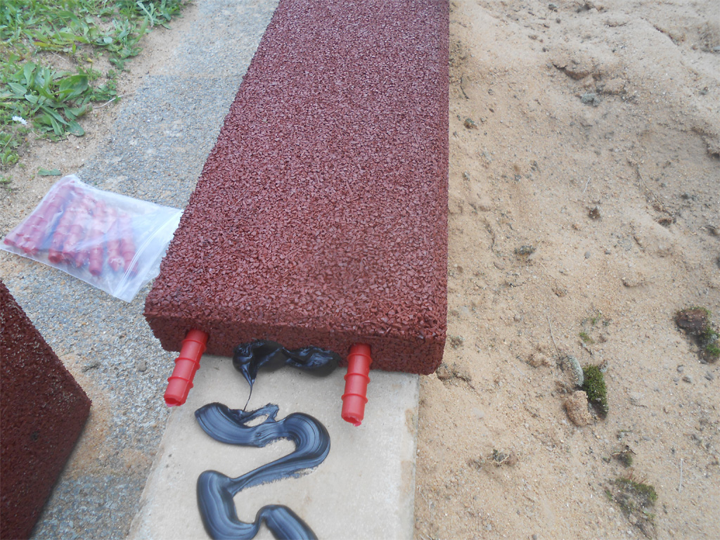Verklebung Sandkasteneinfassung